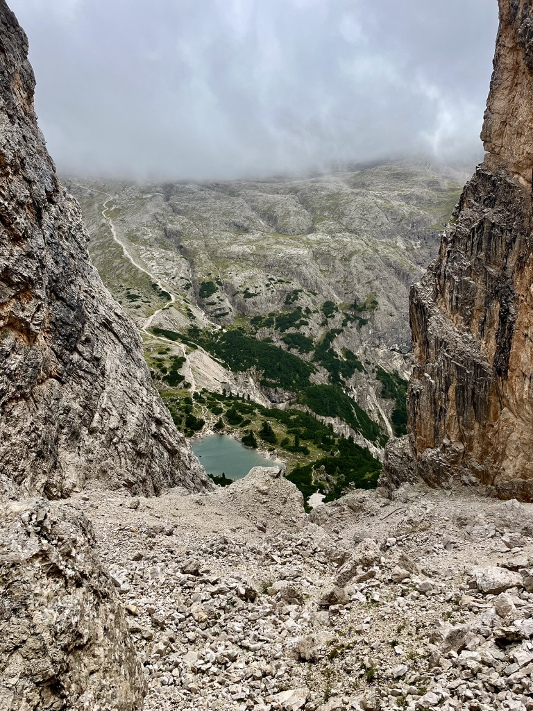 View down to an alpine lake through a rock gap, Day 2