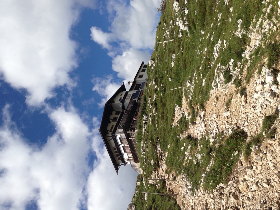 Rifugio Tissi on a cliff-edge ledge below the Civetta massif